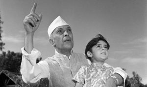 Pandit Jawaharlal Nehru with a child