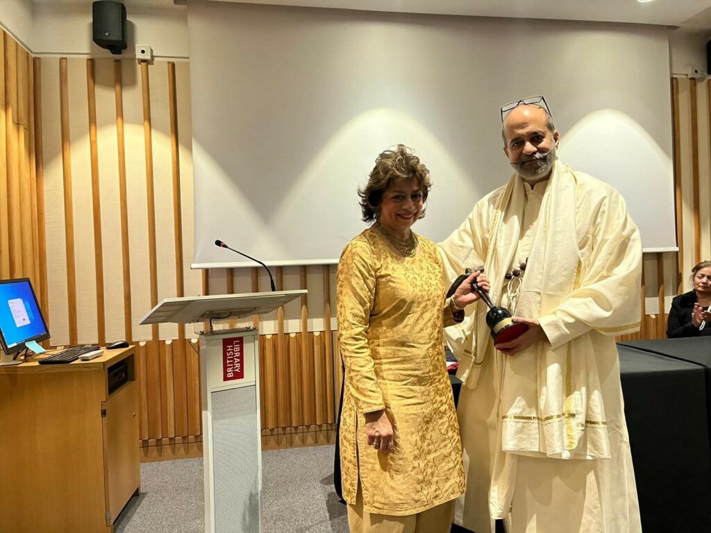 Shree Udayraj A Gadnis receives his award for excellence from mary anne cordeiro